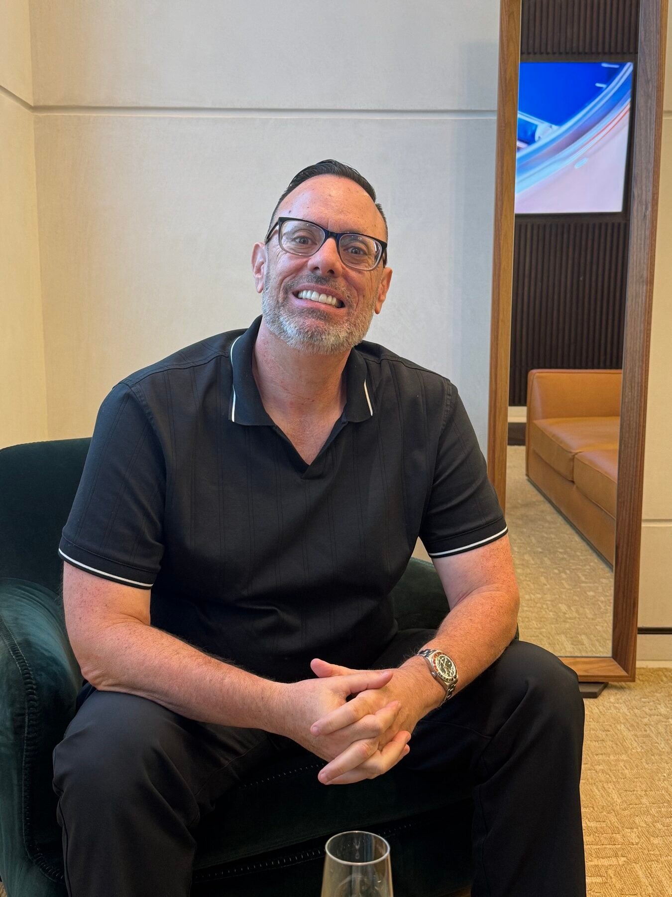 David Bombara seated and smiling